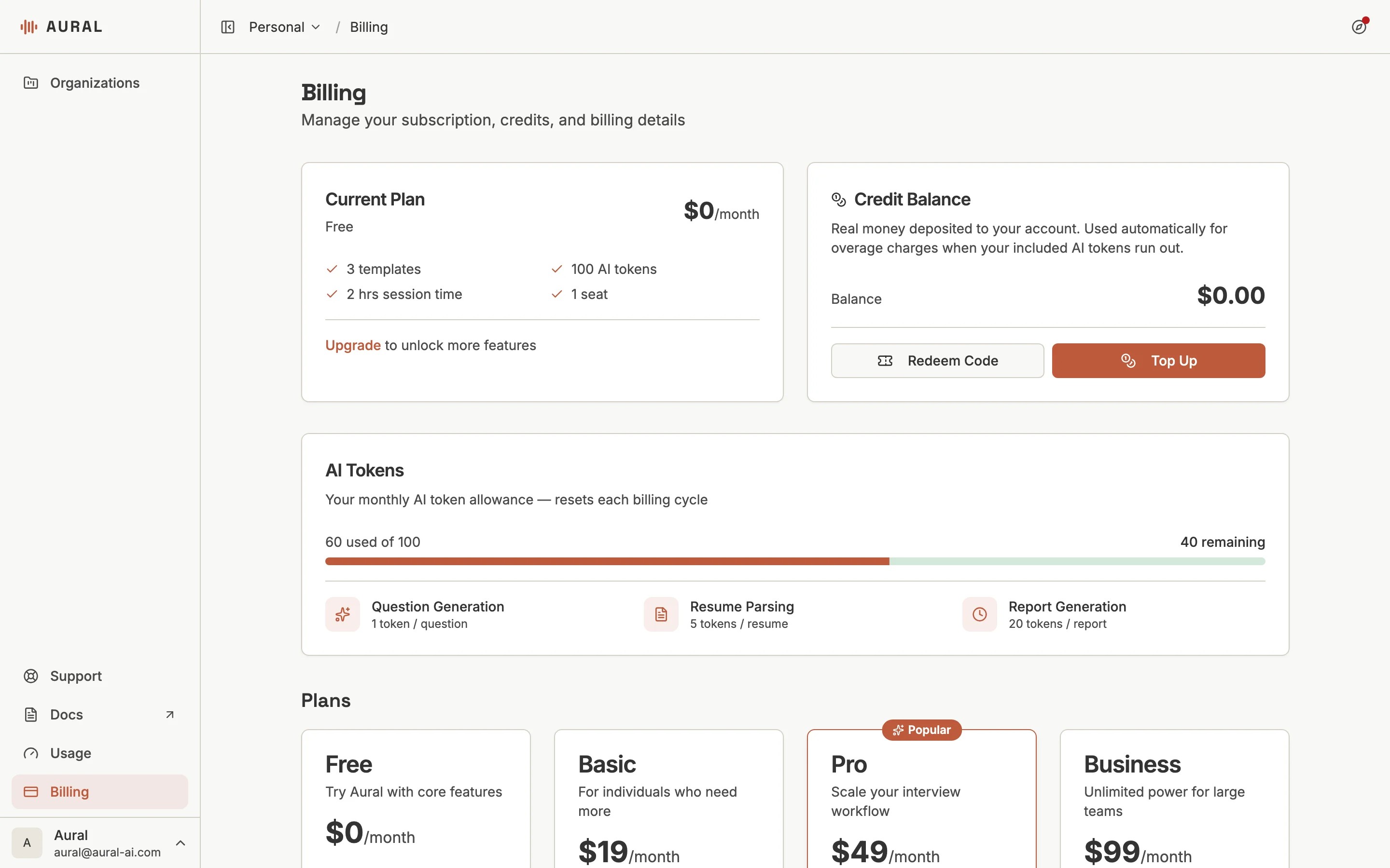 Billing page with plan cards, AI token usage, and credit balance